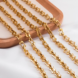Close-up of polished gold-plated geometric link chain for DIY jewelry making and crafts