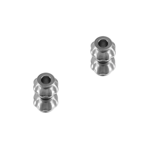 Macro detail of polished stainless steel lantern pumpkin beads for DIY jewelry making