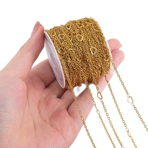 Golden heart-shaped stainless steel chain on a spool for DIY jewelry making