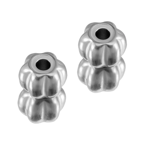 Close-up of pumpkin-shaped stainless steel spacer beads with vertical holes for DIY jewelry