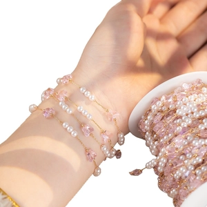 Elegant gold chain bracelet with white pearls and pink butterfly crystal charms for women