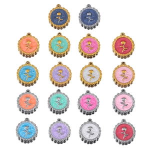 Macro shot of vintage round rose flower charms in multiple colors with scalloped edges