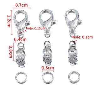 Detailed view of silver lobster clasp set with jump rings and cord ends for jewelry