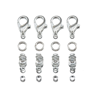 Polished silver alloy jewelry hardware kit including lobster clasps and jump rings