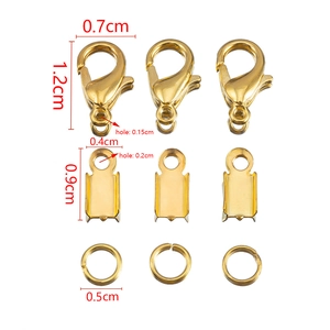 Macro shot of gold lobster clasps and fold-over cord ends for DIY jewelry making