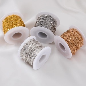 Detailed close-up of brass flat bar chains in four metallic colors for DIY jewelry making