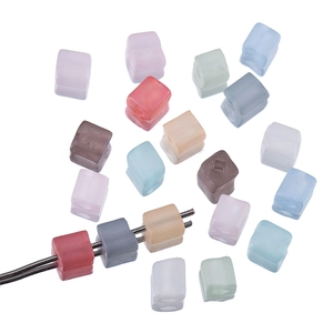 Detail of 4mm matte pastel cube beads with double holes for DIY jewelry making