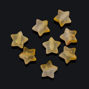 Detalle de cuentas de estrella amarillas de 5mm con purpurina para creación de joyas DIY