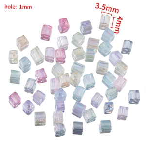 Detail of 4mm iridescent sugar cube glass beads with 1mm hole for DIY jewelry making