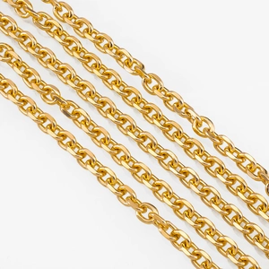 Macro shot of polished gold aluminum chain links for DIY jewelry accessories and crafts