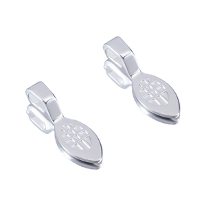 Macro detail of silver pinch bails with geometric grid texture for jewelry making