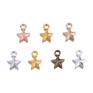 Macro detail of 3D star pendants in seven metallic finishes for DIY jewelry making