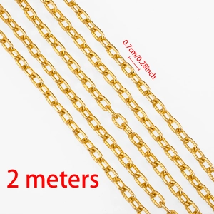 Detail of golden aluminum link chain with cross texture for DIY jewelry making