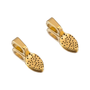 Macro shot of polished gold-plated pendant clips for DIY alloy jewelry components