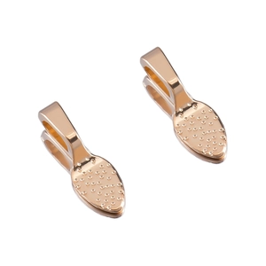 Detailed view of golden teardrop pendant clasps with embossed dot texture for DIY jewelry