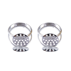 Detail of two silver adjustable ring bases with multi-hole tray for DIY jewelry making