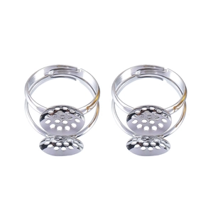 Close-up of adjustable silver ring bases with honeycomb tray for DIY jewelry making