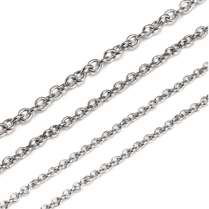 Macro shot of four silver stainless steel O-chains in different thicknesses for jewelry