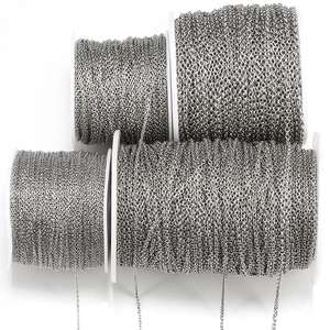 Set of four rolls of silver stainless steel DIY chains in various link sizes for jewelry making