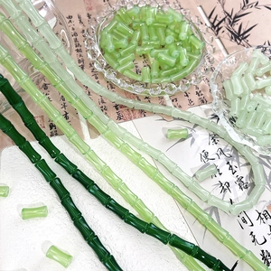 Macro view of Chinese style green bamboo glass beads for DIY jewelry making