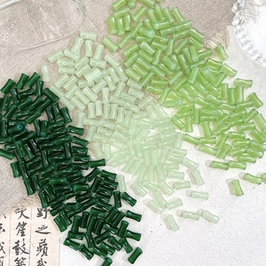 Macro view of Chinese style bamboo cylinder glass beads for DIY jewelry making
