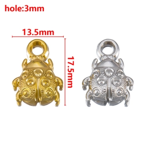 Detailed macro view showing 13.5x17.5mm ladybug charms in gold and silver finish