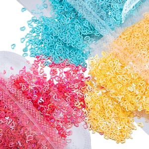 Paillettes a forma di cuore vuoto ciano, magenta e giallo per nail art e fai da te