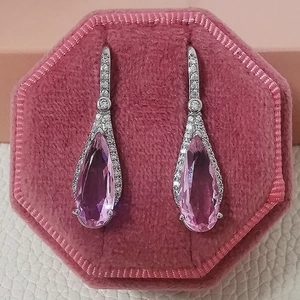 Elegant pear shaped pink diamond drop earrings in silver setting and pink velvet box