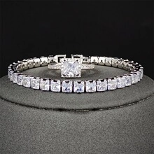 Set bracciale tennis e anello halo con zirconi argento su piedistallo moderno