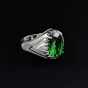 Vintage emerald ring for men in silver finish with pavé set white zircon side stones