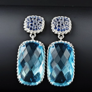 Luxurious long aquamarine drop earrings with large square zircons and silver metal frame