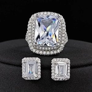 Elegant rectangle-cut crystal jewelry set including silver ring and matching stud earrings