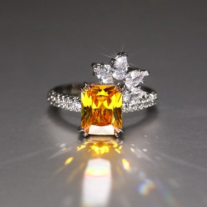 Elegant rectangle yellow zircon flower ring with marquise side stones and pave band