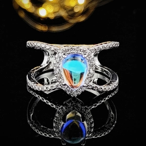 Elegant pear-shaped moonstone ring in silver finish with double-layered pavé band
