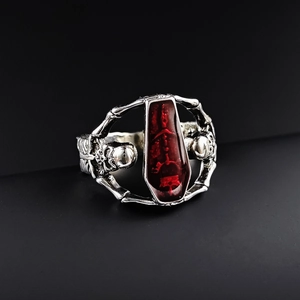 Gothic skull ring featuring a red coffin centerpiece and silver punk bone details