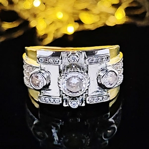 Men's two-tone wide band ring with round center stone and pave-set cubic zirconia
