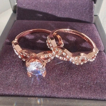 Macro detail of 925 hallmark on rose gold plated silver ring set with round cz stones