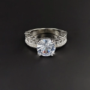 Macro shot of S925 sterling silver stamp and sparkling AAA zircon on luxury ring band