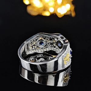 Vintage palace style wide band ring with blue sapphire and yellow diamonds