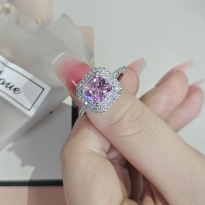 Elegant silver ring with a large square pink zircon and pave-set white cubic zirconia stones