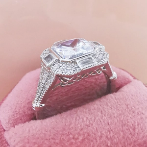 Vintage palace style silver ring featuring a large square zircon with micro-pave diamonds