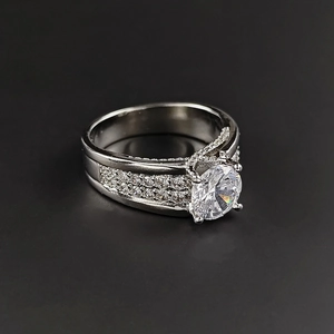Luxury silver square cut solitaire ring with sparkling side stone diamond setting