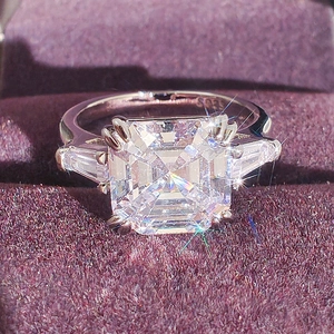 Luxury S925 sterling silver three-stone ring with square center gem and velvet box
