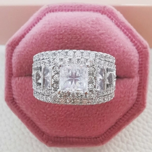 Luxury wide band ring with princess cut cubic zirconia in pink velvet jewelry box