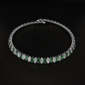 Elegant emerald and white marquise cut gemstone tennis necklace in silver finish