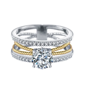 Bague multicouche élégante avec pierre centrale ronde et finition métallique bicolore