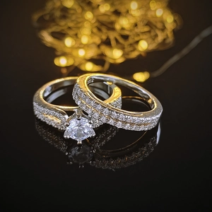 Luxury S925 sterling silver ring set with classic round cut cubic zirconia on black surface