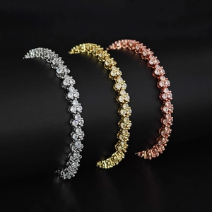 Set di tre bracciali tennis in argento, oro e oro rosa con zirconi a grappolo