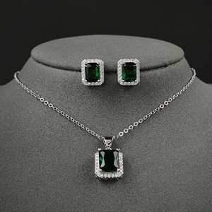Emerald-cut green zircon necklace and stud earrings set in polished silver setting