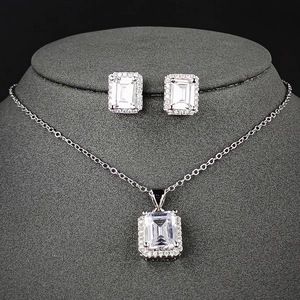 Elegant jewelry set with emerald cut square zircon pendant necklace and matching halo earrings
